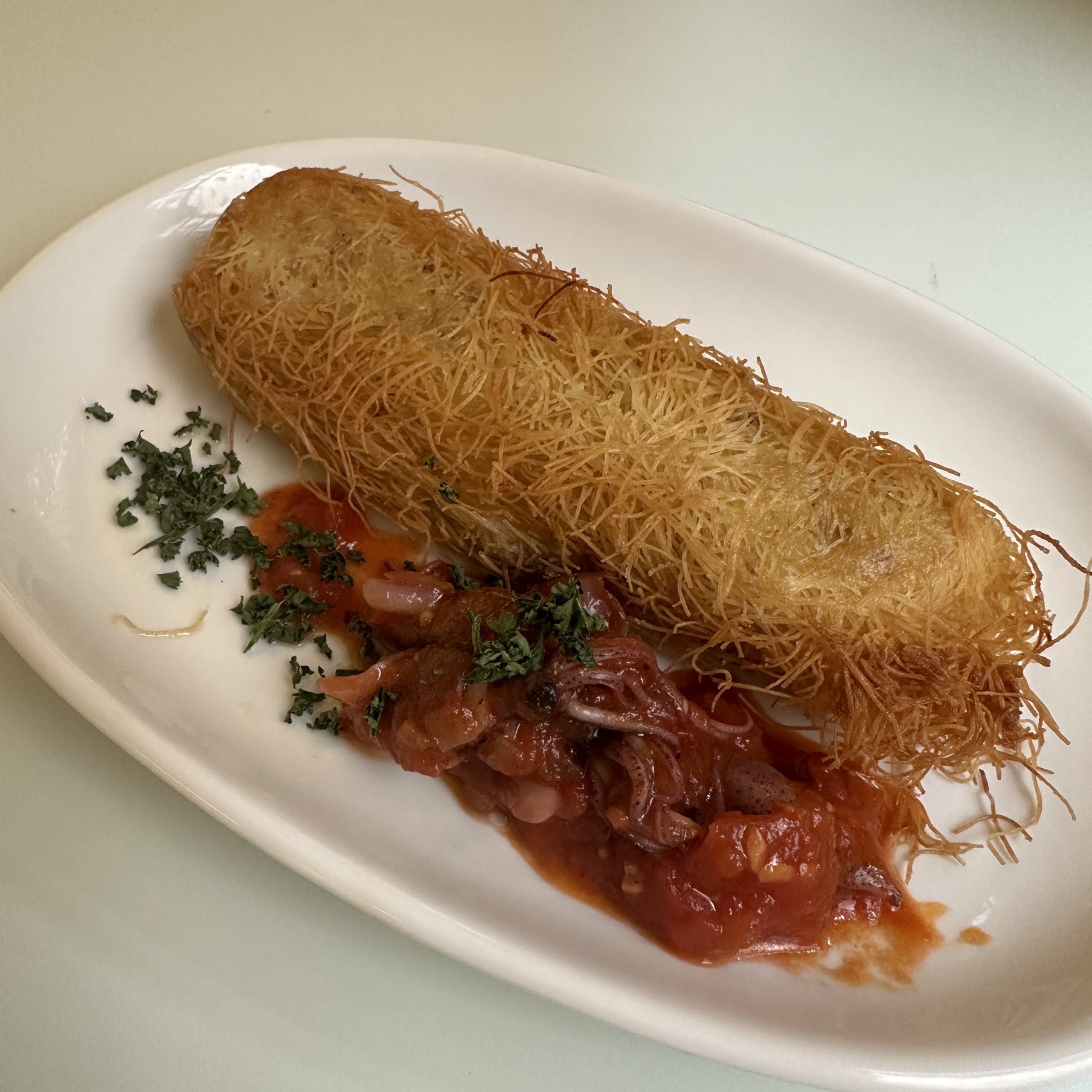 - 3月の旬菜 -<br />
真鯛のカダイフ包み焼き ホタルイカのアラビアータソース